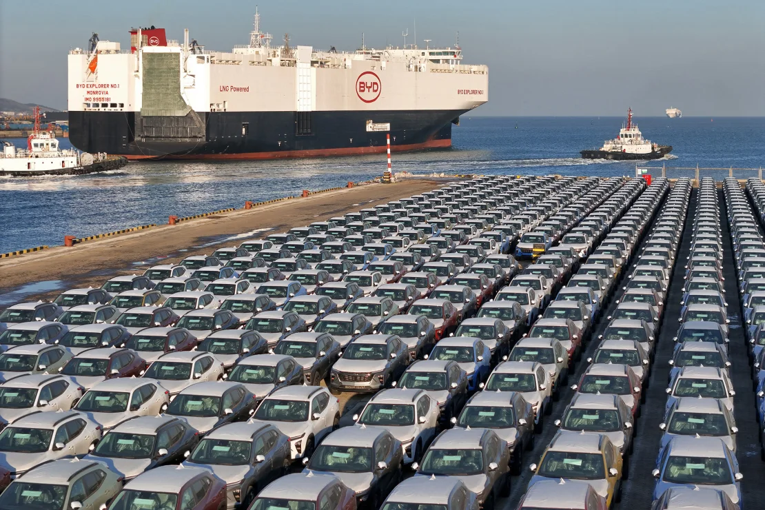 BYD electric cars are waiting to be loaded onto the "BYD Explorer No 1," a vessel intended to export Chinese automobiles, at Yantai port, in eastern China's Shandong province on January 10, 2024.
